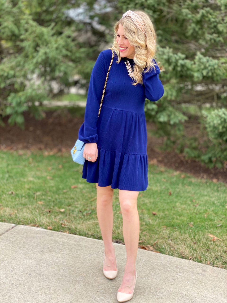 navy easter dress, light blue quilted bag, long sleeve navy dress