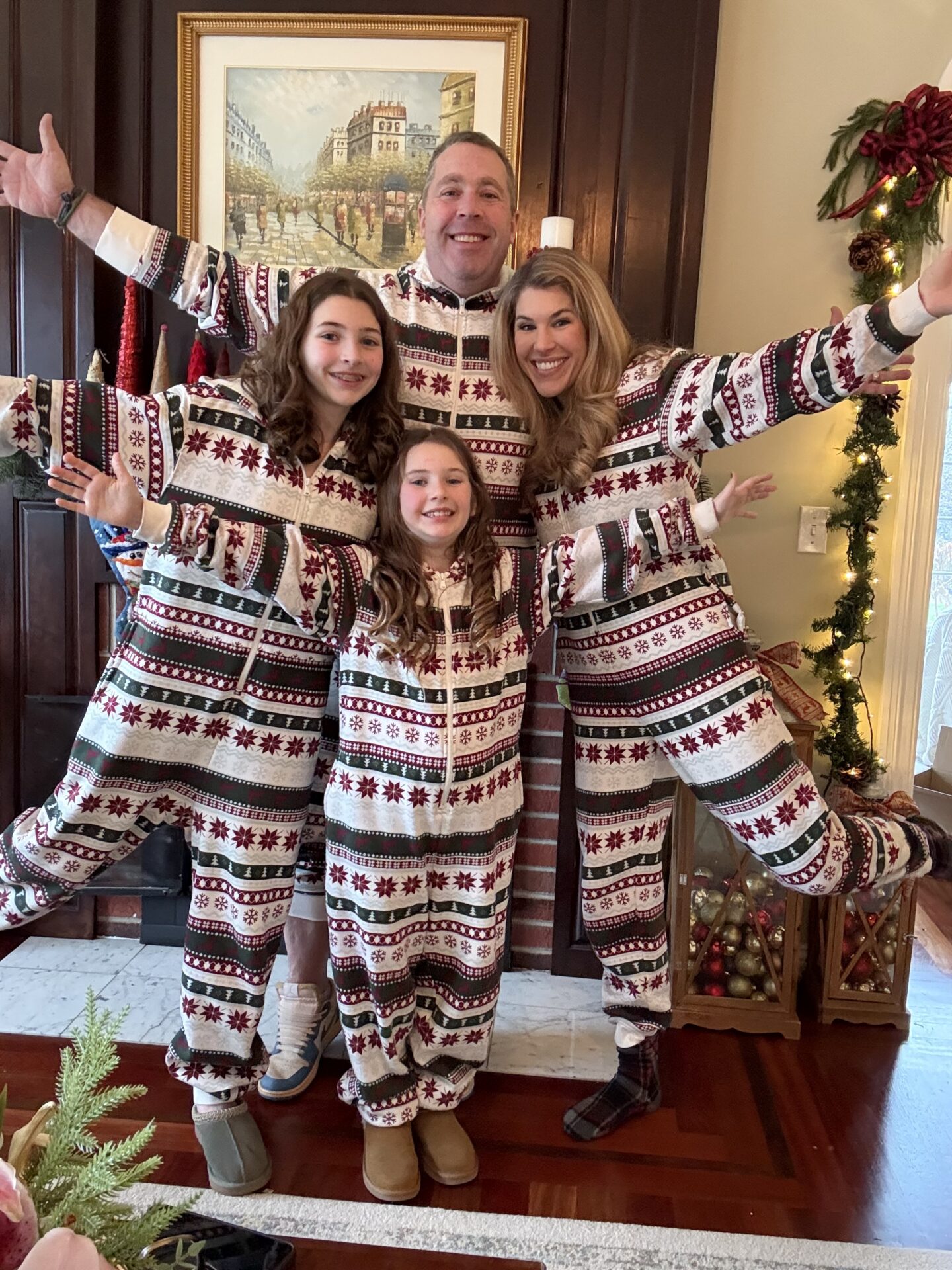 December 2025 family wearing matching Christmas pajamas