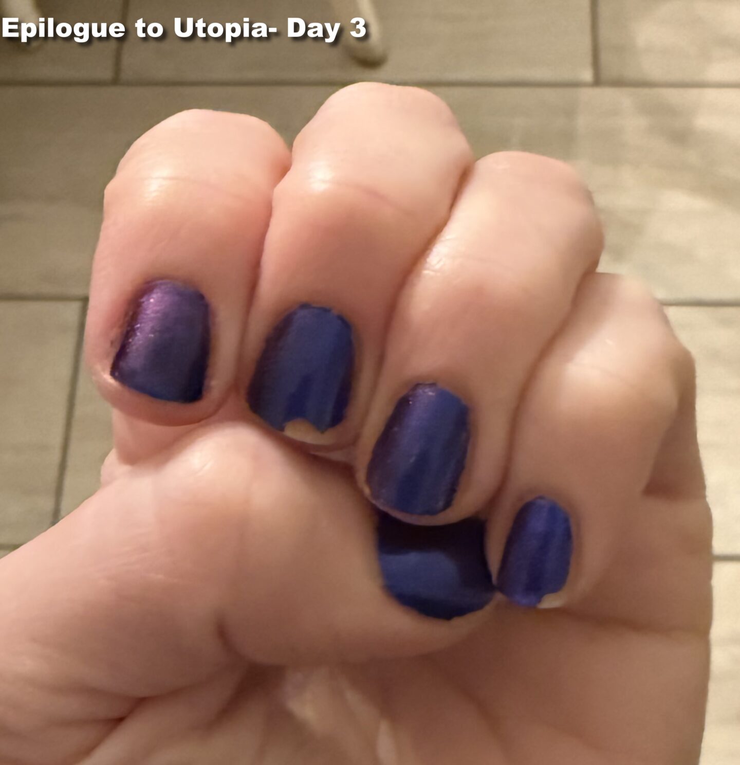 Deep purple polish with subtle shimmer, day 3 wear